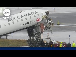 Video shows moment Air Canada plane hit fire truck at LaGuardia Airport
