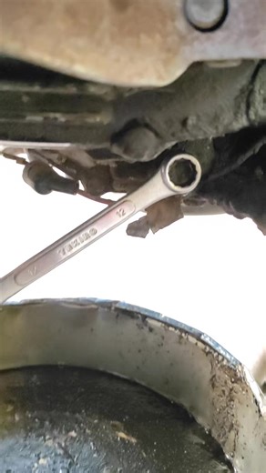 Loosening the Yamaha Engine Oil Tap Bolt