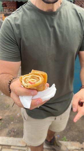 7.8K views · 252 reactions |  When in Uganda, you have to start your day with a rolex! But what is a rolex you ask? Well, it is NOT a watch. In fact, it is an omelet with tomato, pepper and onion rulled up inside a chapati and it's delicious!!!  #uganda #streetfood | Dave Mani | Facebook
