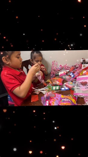 Making valantine goody bags for school.