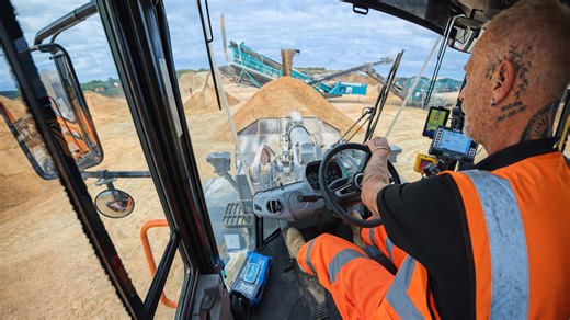 Inside the cab of a heavy loading giant