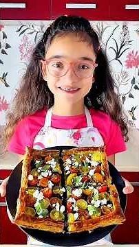 A Girl Makes a Puff Pastry Tart with Tomatoes, Olives & Bulgarian Cheese – Easy and Delicious!