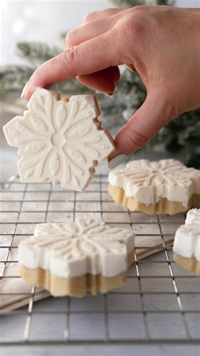 This cookie mold trick works with buttercream too! I used the same steps as my previous reel but used Swiss Meringue Buttercream instead of candy melts. Here's the steps... 1. Press cookie dough into silicone mold 2. Bake cookies and allow to fully cool 3. Carefully remove cookies from mold, and wash the mold. 4. Pipe buttercream into mold, tap out air bubbles, and then place cookies back into the mold. 5. Allow assembled cookies to chill in the freezer for 30 minutes, or until completely frozen