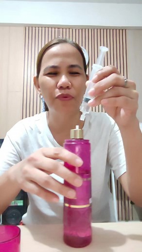 Refilling Perfume Using a Syringe
