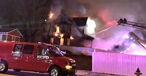 WATCH: Crews fight large house fire in KCMO