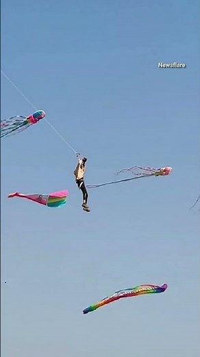 Chinese man dragged into sky by giant kite #shorts