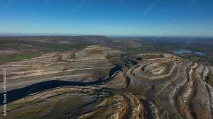The Burren, Mullaghmore, County Clare, Ireland, November 2023. Drone pulls backwards over the spectacular natural rugged Limestone landscape in the Burren National Park on the Wild Atlantic Way.