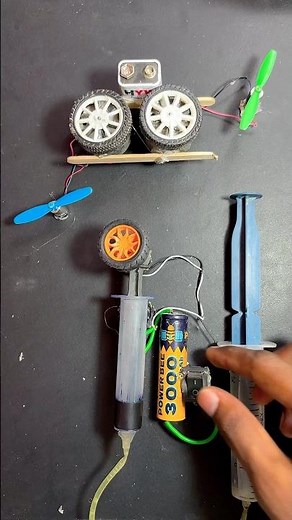 Electricity Generation in Interconnected DC Motors via Wheel-to-Wheel Contact Mechanism