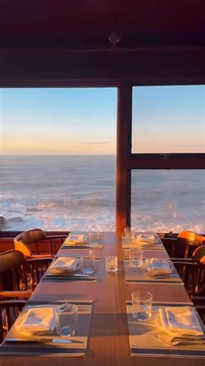 Halyard Restaurant on Instagram: "Golden hour hits a little differently in the Library. Warm light, waterfront views, a cocktail in hand with the Sound stretching endlessly beyond the windows. We’re open for dinner Thursday – Monday, and tonight we invite you to linger a little longer with a special live performance by @khouryoke in the Piano Bar from 6–8PM. 🌊✨ #SoundViewGreenport #seeyouatsoundview #thehalyardgreenport"