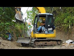 Excavator Installing Storm Drain