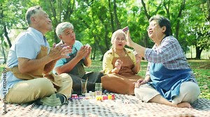 Happy group elderly asian gather together relax shady garden recreational activities show their talents creativity design paint colorful plaster relax show off your skills making good and healthy.