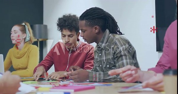 Two men picking color paper, folding in design studio, bringing subtle code overlays for model