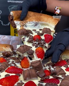 Treat yourself to this delightful pizza topped with rich melted chocolate and fresh strawberries! 🍓🍫🍕 Tag a friend you'd share this with! 📸: Instagram / @pizzaspatos #geekyfork #pizza | Taste Lab