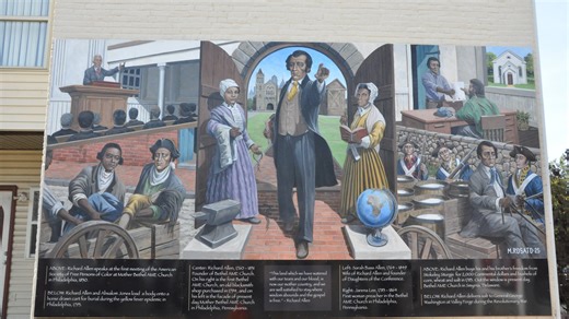 AME Church 1st District Bishop Samuel L. Green Sr. speaks at the unveiling of the Richard Allen mural in Smyrna