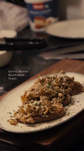 Snuzzles Café | Jayanagar on Instagram: "Golden, garlicky, and perfectly toasty! 🧄✨ Our Garlic Butter Mushroom Toast is where comfort meets flavor — crispy sourdough, buttery mushrooms, and that irresistible café aroma that makes Snuzzles your favorite Jayanagar spot. 🍄☕ Because sometimes, happiness really is served on toast! 😋 📍 Snuzzles Café, Jayanagar #TasteTheComfort #SnuzzlesVibes {snuzzles cafe jayanagar, garlic butter mushroom toast, best cafes in bangalore, snuzzles food, cozy cafes 