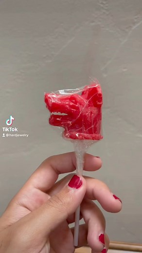 HARD JEWELRY® on Instagram: "I made Hellhound Lollipops😋🍭 and they’re naturally flavored with cherry🍒!!! They’re actually pretty fire too tbh I was going to have these be a freebie in orders last year but… I decided not to For health concerns and I did the want to deal with the FDA knocking on my door lol So the idea is put on hold til I figure how I can give these out… Maybe at the LA pop up⁉️⁉️"