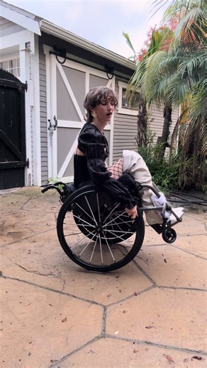 Would this work on you? 👀 For science…. Alt text: a woman in a Wheelcahir rolls into frame and stops in a wheelie & 360 drifts. Then she does another spin, and backs out of the frame still in a wheelie. #Funny #Random #Wheelie #Drift