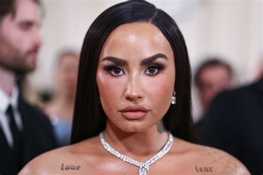 Demi Lovato Stuns in Poolside Photos