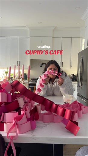 how I’m actually using the viral heart paper chains! Stay tuned for so many galentines DIYs over the next couple of weeks #heartpaperchains #paperchain #valentinesday2026 #galentines #girls cupidscafe