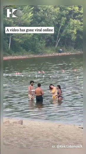 Group of people captured using soap while bathing at Canadian lake