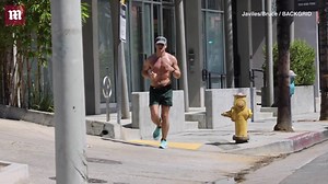 Colin Farrell shows off his chiseled abs as he enjoys a jog out in Los Angeles