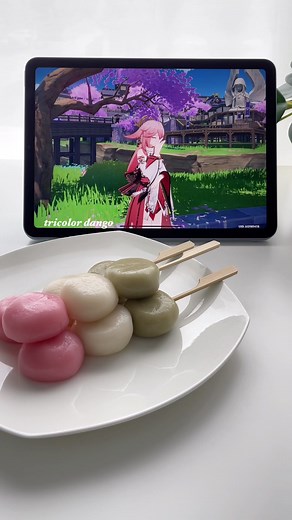 making tricolor dango using mochiko, sugar and water! Using silken tofu will make the dango more chewy but water is a good alternative if you don’t have tofu at home! recipe: - 100g mochiko (sweet rice flour) - 40g sugar (or more if you want) - 75ml warm water - matcha powder - red food coloring - skewers Soak the skewers in water. Combine the mochiko, sugar and water together to form a dough. Add more mochiko if the dough is too wet or water if it’s too dry. Split the dough into 3 parts. Combin