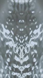 Movement of water while vibrating, mirror effect - Free Stock Video