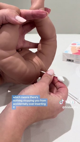 Some doctors or parents will use a Q-tip or cotton swab to help a constipated baby pass their poop. From what we can tell, there are many different methods, but here’s why you might not want to insert a Q-tip into your baby’s butt and what you can do instead to safely and easily relieve their constipation, gas or colic. #parentingtips #colickybaby #constipatedbabies #babymusthaves #gassybaby #fridababy #fridababywindi #constipationrelief