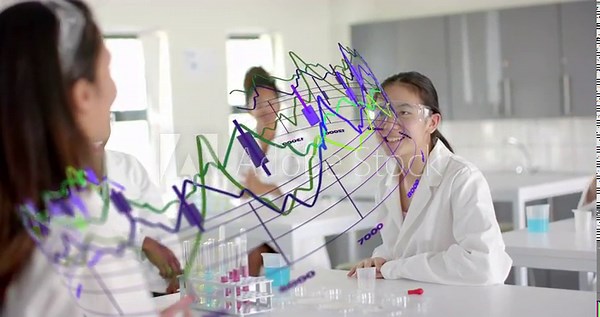 Teacher tapping chart in science class guiding students raising fingers writing notes and analyzing