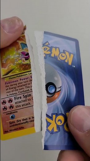 Ripping up my $70 Charizard 😡 | How to tell if a Pokémon Card is Fake!