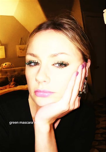 Nostalgic VHS Tape Aesthetic with Green Mascara