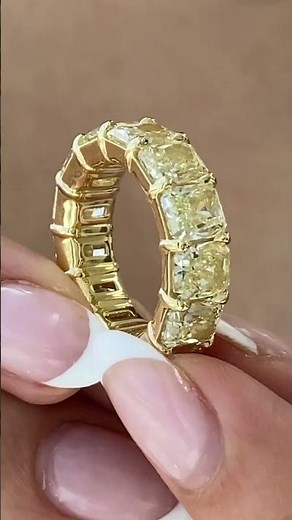 This 13ct Fancy Yellow Radiant Cut Diamond Eternity Band is calling your name!