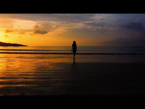 Girl walking at the beach 4k