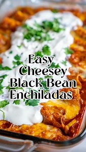 Need an easy dinner idea? These black bean enchiladas take no time to assemble and come out warm, cheesey and delicious of course! Try this for your next night-in when you’re looking for something effortless to create in your kitchen! Full recipe: https://12tomatoes.com/easy-cheesy-black-bean-enchiladas/ #dinnerideas #12tomatoes #cookingwith12t #enchiladas #blackbeanenchiladas #mexicanmeal #mexicanfood #tacotuesday #dinnerrecipes #recipesideas | 12 Tomatoes
