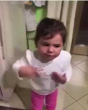 Italian baby talking gibberish with all the hand signals