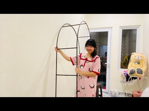 Meigi Zelvey is live! Working hard to install the garden trellis