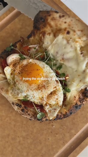 Crate and Barrel on Instagram: "Today’s the big game! We’re staying fueled with the viral pizza breakfast sandwich. 🍕 🍳 We made ours in the @oonihq Koda with 2 kinds of mozzarella, tomato sauce, micro greens, pepperoni and spices. Pizzas cook in 60 seconds in the Ooni. No, that’s not a typo! 🤯 #Pizza #PizzaSandwich #Ooni"