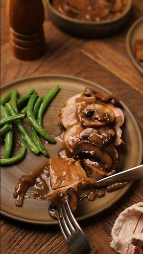 Juicy smothered pork tenderloin with mushroom onion sauce. #porkrecipe #dinnerideas