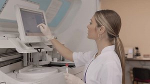 Female Scientist Working in The Lab, Using Computer Screen