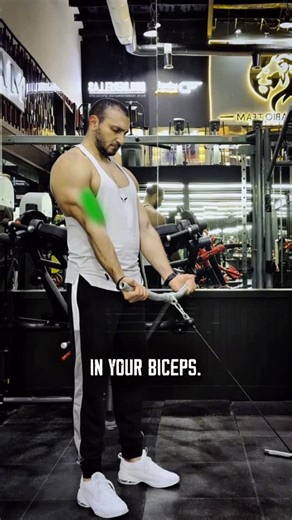 ‎Ahmed Mokbel | أحمد مقبل‎ on Instagram: "🔥 Explode Your Biceps with This Cable Hack! 💪 Stop swinging the weight and start growing your arms! The cable bicep curl is a game-changer for constant tension, but only if you do it right. Here is how to master the move: • Lock Your Elbows: Keep your elbows pinned to your sides. They shouldn’t move forward or backward. • Full Range of Motion: Extend your arms all the way down for a deep stretch, then squeeze hard at the top. 📏 • Control the Negative