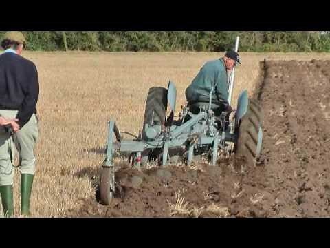 Grey Fergie Pulling 5 Furrows