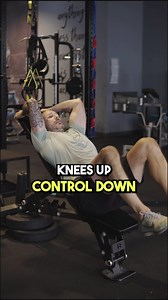 Best Exercise To Strengthen & Develop Lower Abs ------------- I'm a fan of the reverse crunch exercise to strengthen lower abs, and there's many variations of it, but here's my favorite one. Create an incline on the bench and grab on the back of it, or grab another object to hold on to and create stability. From there pull your pelvis towards your ribs and then drive the knees up to the ceiling (people tend to roll back here which doesn't work the abs as much). As you bring the legs down get a s