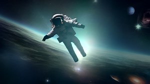 An astronaut lost in space drifting tthrough the universe after a space walk | Premium Stock Video Footage