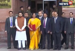 Finance Minister Nirmala Sitharaman and MoS Finance Anurag Thakur with Budget Bahi Khata outside the Finance Ministry. #BudgetWithNews18 | News18