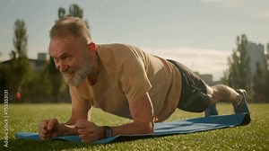 Elderly Caucasian man pensioner stand in plank motivated power bodycare sportsman sportive athlete training workout strength bodybuilder energetic agility masculinity confident muscular arms longevity
