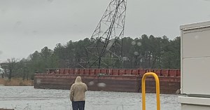 Transmission tower in Chesapeake now leaning after barge strikes it near High Rise Bridge