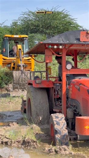 KABOTO tractor recovery by BACKHOE LOADER