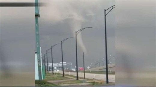 Tornado touches down in Kansas town as winds raise fire risks out West