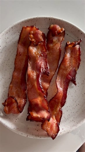 Making bacon in the air fryer is a game changer! It's perfectly crisp every time and there are no messy spatters to clean up! 🥓 Comment "RECIPE" to have a link to recipe sent straight to your DM. Get the Recipe: https://flavorthemoments.com/crispy-air-fryer-bacon/ | Flavor The Moments
