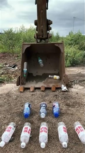 Excavator challenges picking up bottles